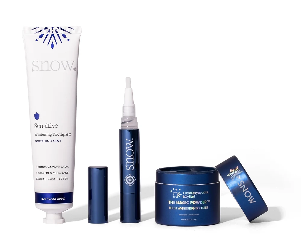 Snow sensitive whitening toothpaste, overnight pen and Magic Powder jar side by side